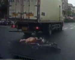 Truck crushes young Chinese woman on electric scooter